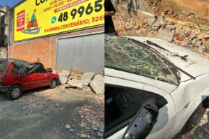 Queda de muro provoca danos em três automóveis em estacionamento no Centro de Criciúma