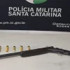 Arma apreendida com o homem em Maracajá