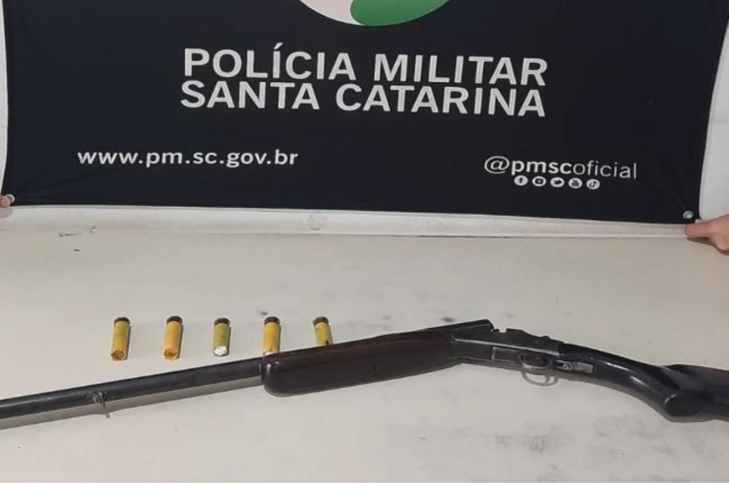 Arma apreendida com o homem em Maracajá