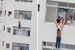 Mulher quase cai do 15º andar ao limpar janela de apartamento