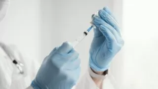 Doctor Getting Ready Vaccine Patient Scaled 2
