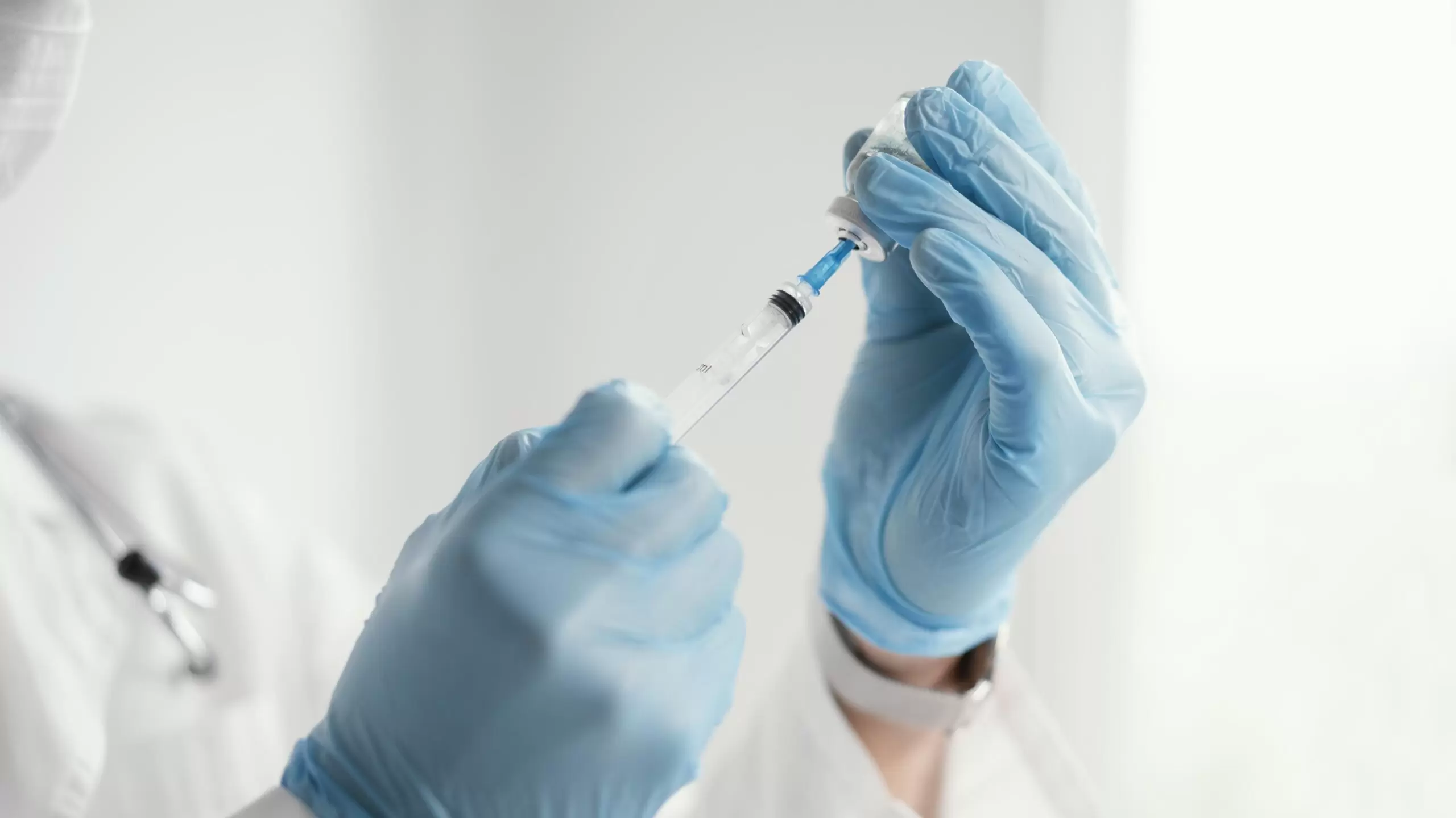Doctor Getting Ready Vaccine Patient Scaled 2